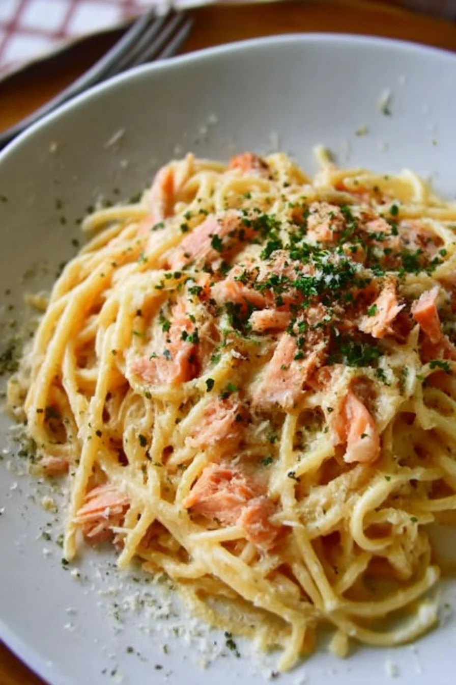 Plate of smoked salmon carbonara with pasta and creamy sauce