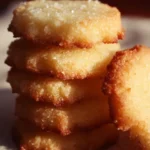 Freshly baked 3-ingredient butter cookies on a baking tray