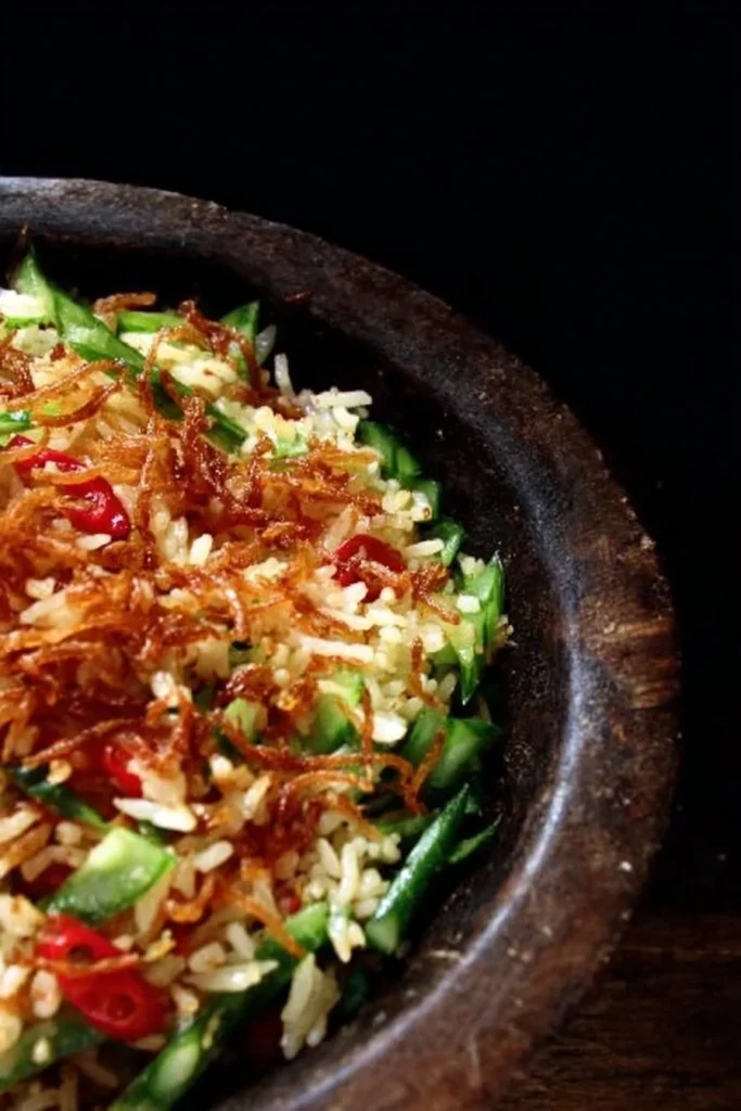 A vibrant Crispy Rice Salad with fresh vegetables and a flavorful dressing.