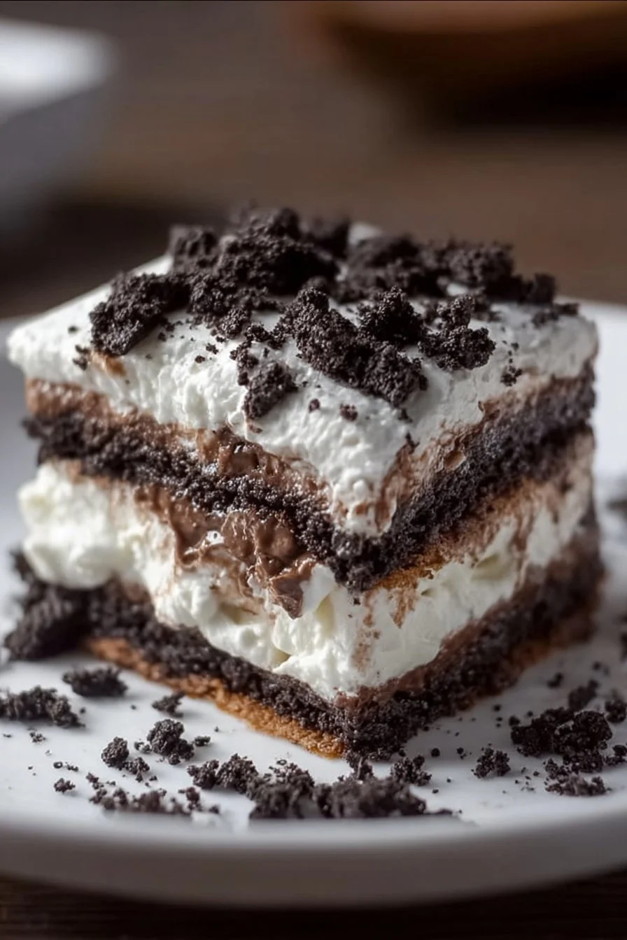 Five Layer Oreo Lasagna 2 Delicious Five Layer Oreo Lasagna dessert with creamy layers and Oreo cookies