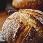 Freshly baked artisan bread on a wooden table
