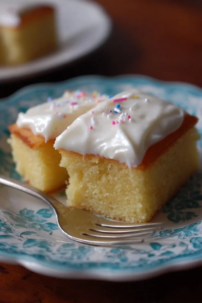 Delicious Copycat Costco Vanilla Sheet Cake with frosting and sprinkles