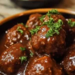 Delicious Salisbury Steak Meatballs cooked in a slow cooker with savory gravy