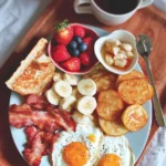 Delicious breakfast spread for mom including fresh fruits and pastries