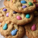 Colorful Easter M&M cookies fresh out of the oven topped with chocolate candies