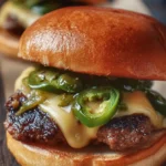 Jalapeño-Onion Smash Burger with juicy meat, fresh jalapeños, and grilled onions.