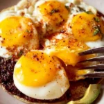 Delicious Ranch Style Eggs with colorful vegetables on a plate